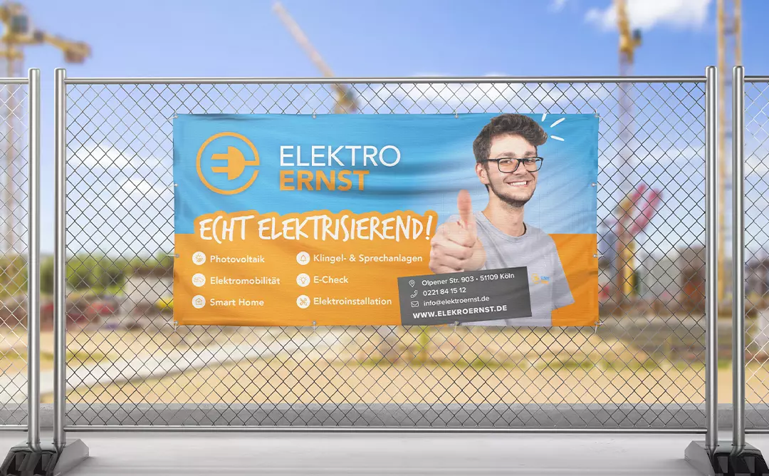 Plakat von Elektro Ernst an einem Bauzaun